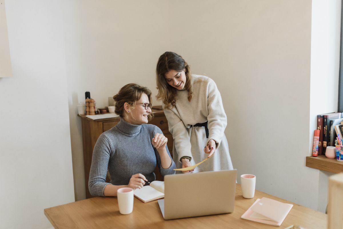 Colleague managing appointments on screen